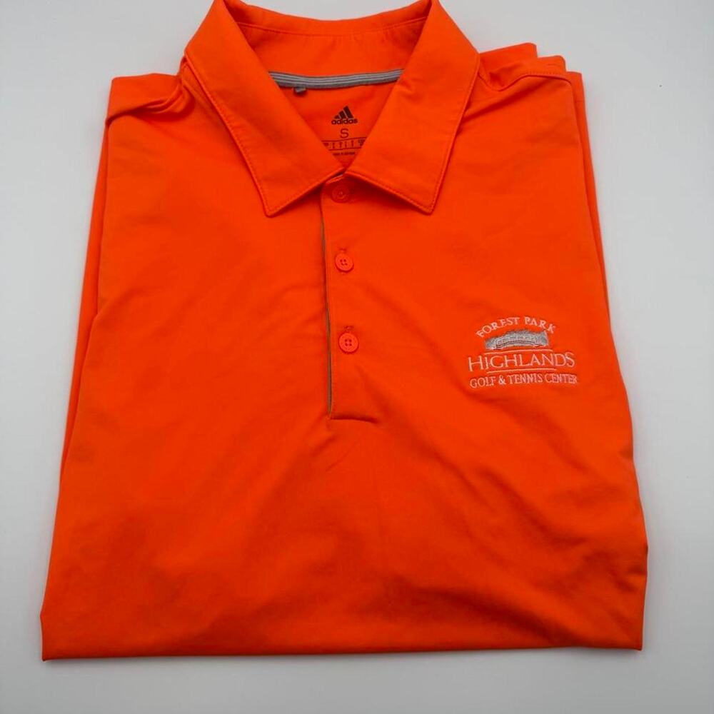Adidas golf polo orange size small. Forest park Hylands golf and tennis center
